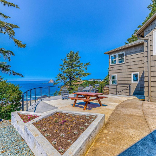 Quaint ocean view escape with modern interior smart TV and gorgeous deck