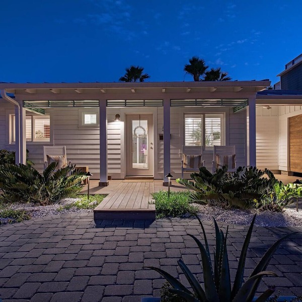 Recently Remastered Beachside Boat House STEPS from the Ocean with HEATED pool.