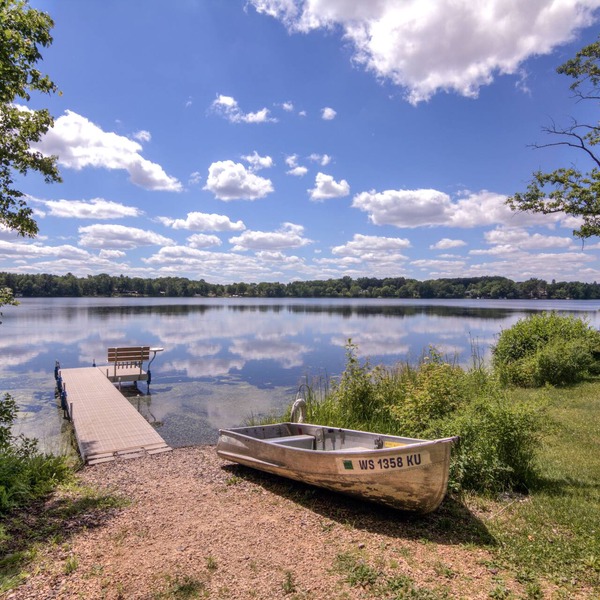 Riverfront cabin with kayaks and canoes