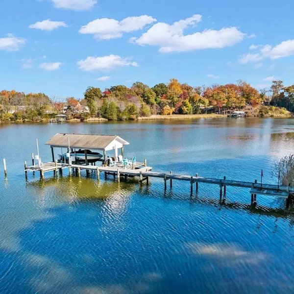 Riverfront Home w/Dock · Fire Pit · Kids Play Area