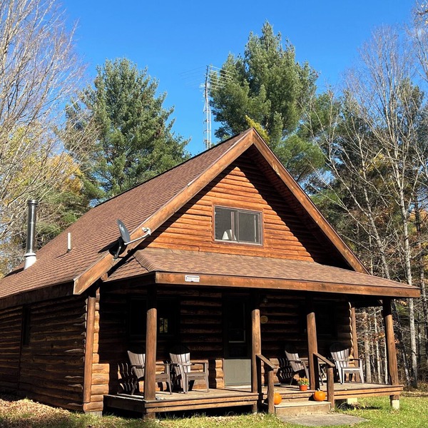 Rustic Forest Getaway has the comforts of home surrounded by woods and water.