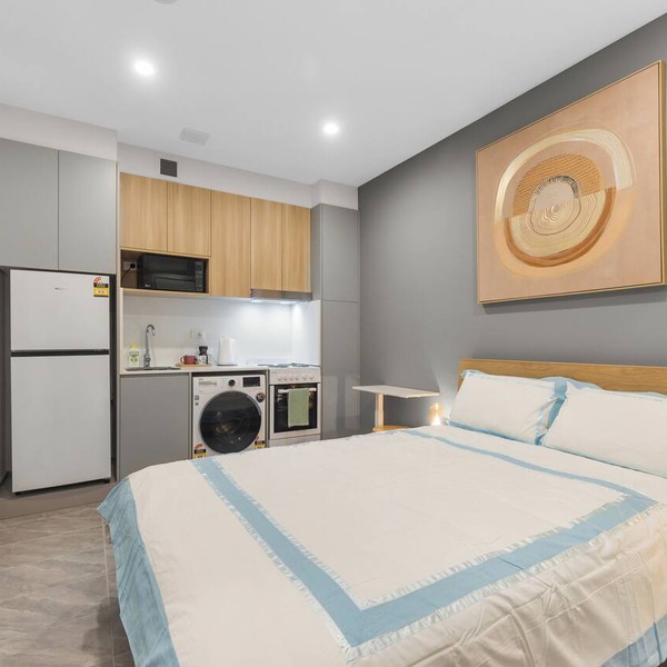 Self-contained studio near train station