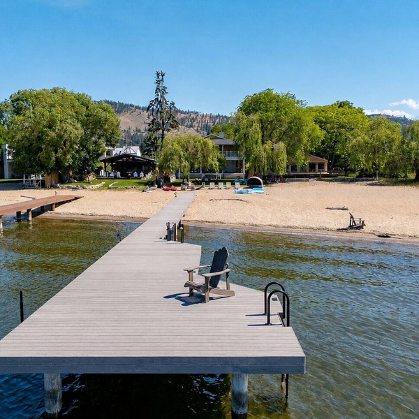Spacious 4-bedroom home with private beach, dock, large yard, outdoor shower.