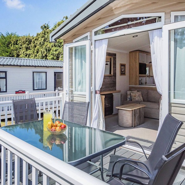 Spacious and luxurious 12ft-wide caravan with one double and two twin bedrooms.