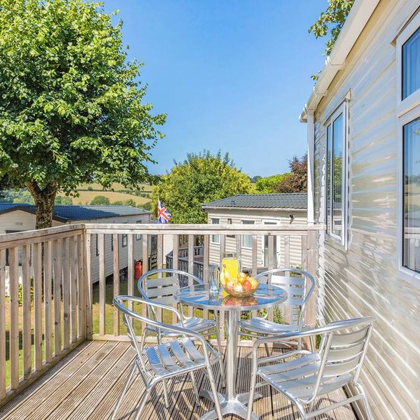 Spacious and luxurious 12ft-wide caravan with one double and one twin bedroom.