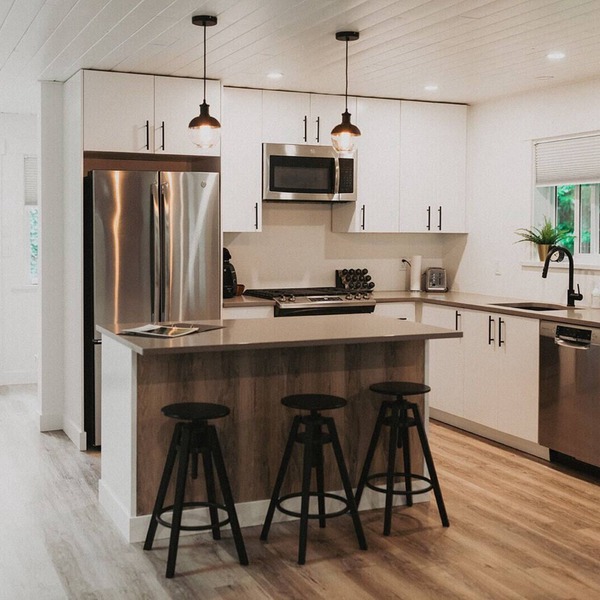 Spacious and modern 2 bedroom 2 bathroom cottage with private yard.