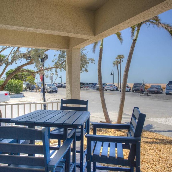 Spacious corner unit on Pass-A-Grille Beach. Beach access Heated pool. Next to restaurants and shops