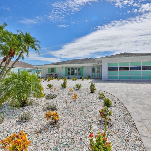 Spacious waterfront home in Apollo Beach w/private swimming pool and boat dock.
