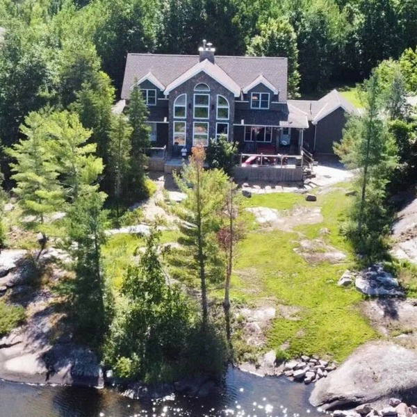 Spectacular Waterfront Escape: Experience Timber Frame Tranquility