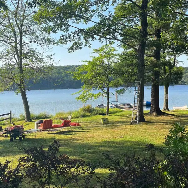 Spring fed Lake front home floating dock and boats