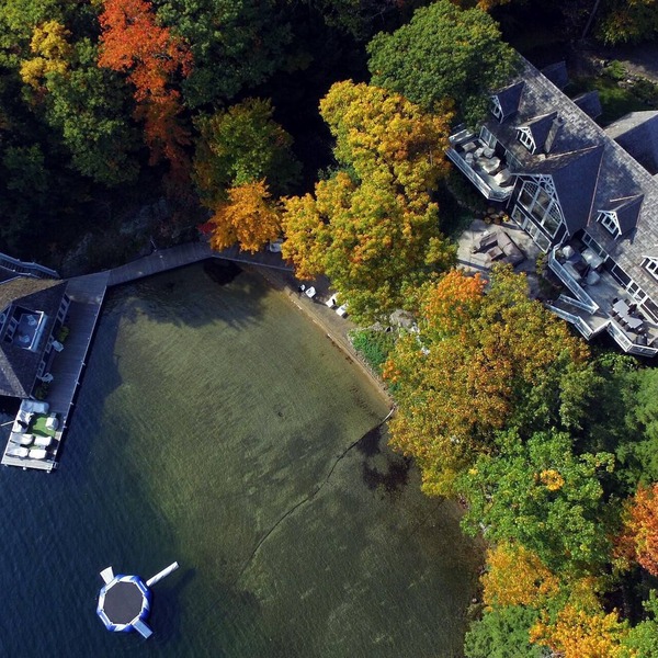 Stunning 6 brdm, 7 bath cottage on Lake Joe! Sand Beach! Boathouse! Has it All!