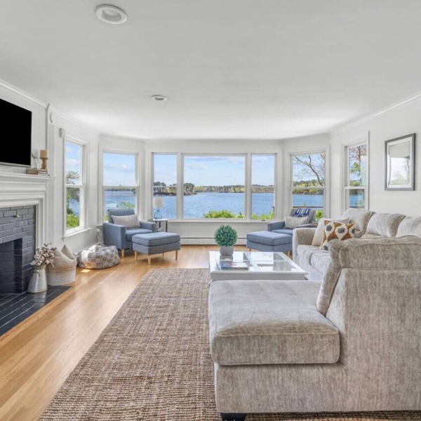 Stunning Waterfront Home with Hot Tub, Deck, Fire Pits, Office & More