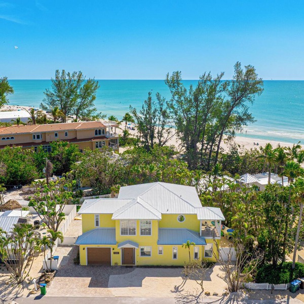 Surfside AMI; backyard oasis steps to beach, heated pool, putting green,+gear!