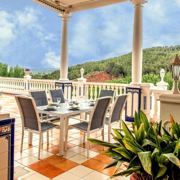 That impress patio overlooking mountains and the sound of water in the fountain