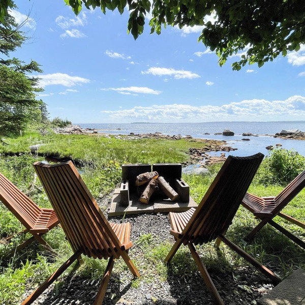 The oceanside Hideaway is nestled between the trees with stunning ocean views