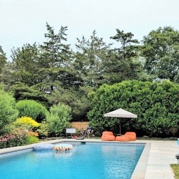 Timeless Shingled Hampton Bays Retreat with Private Heated Pool, An.