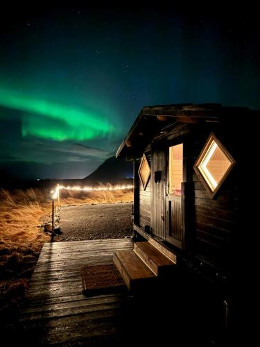 Tiny Cabin Under the Northern Lights