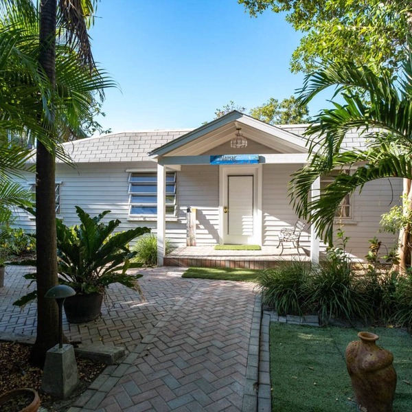 Tropical bayfront villa with sandy beach