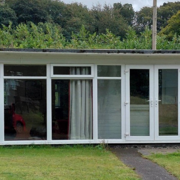 Two bedroom chalet on beautiful and wild Glan Gwna holiday park, with fishing.