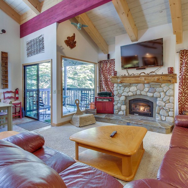 Two-level, forest-view condo with deck - steps from the Village & Ski Back Trail