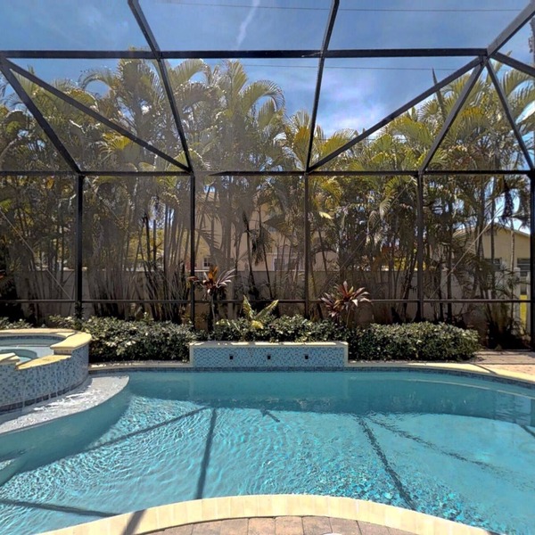 Two Master Bedrooms! Less than 1 Mile to the beach with heated pool and spa