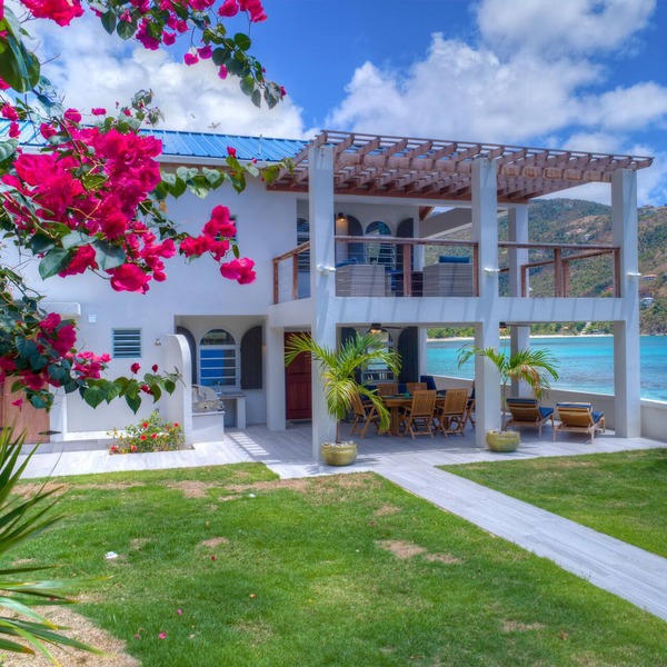 Unique beach front property steps away from the beautiful waters of brewers bay.