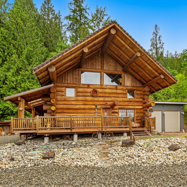 Unique mountain view log home with a wood stove, balcony, patio, & board games
