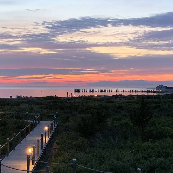 Updated Modern Waterfront condo with private beach, pool, tennis, pier & more.