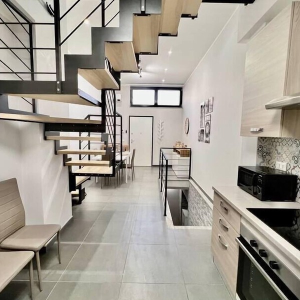 Valuable Duplex one minute from the metro