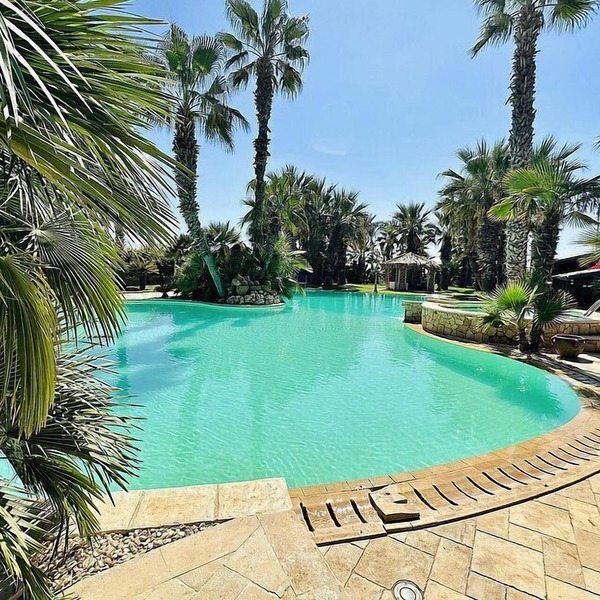 Villa Adelaide: A welcoming two-story villa situated at a few steps from a sandy beach, with Free WI-FI.