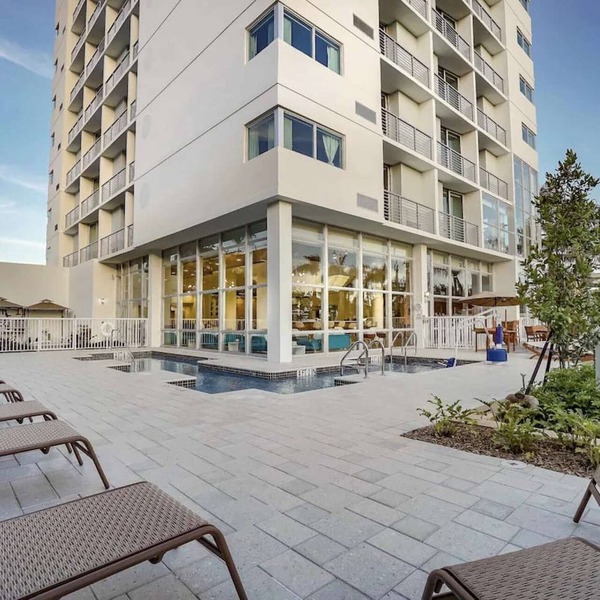 Waterfront Elegance Near Cruiseport | Pool & Gym