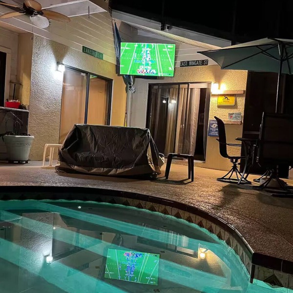Waterfront Lake Tarpon Home with heated salt water pool, fitness room, WiFi