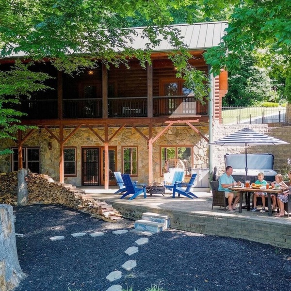 Waterfront Log Cabin w/Hot Tub, Kayaks, Firepit, King Beds, & Pets OK