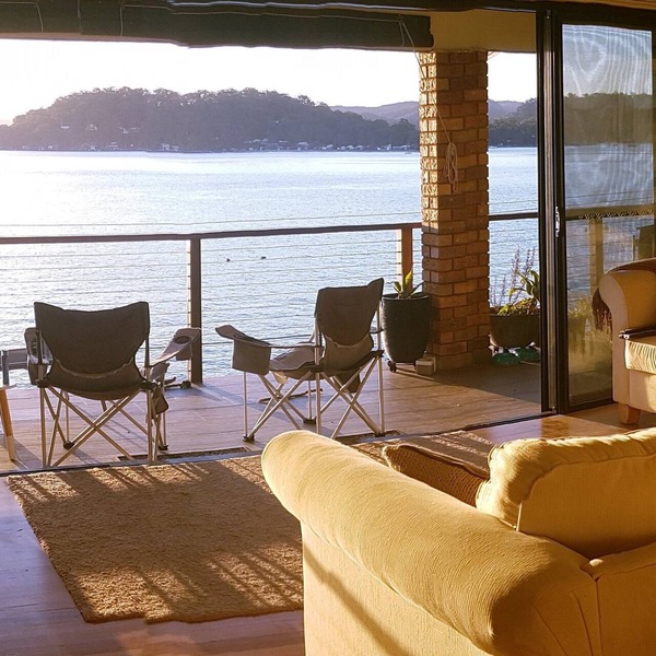 Waterfront with private jetty and sunset views. Boat access only. Pet friendly.