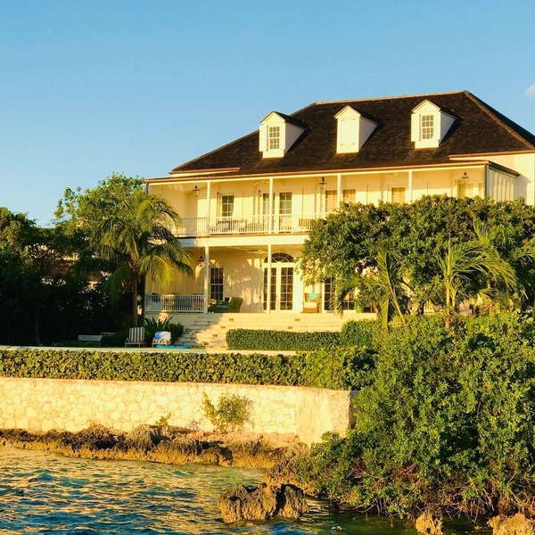 Wind Whistle Harbour Villa- a classic Bahamian 2.5 story veranda-style house.