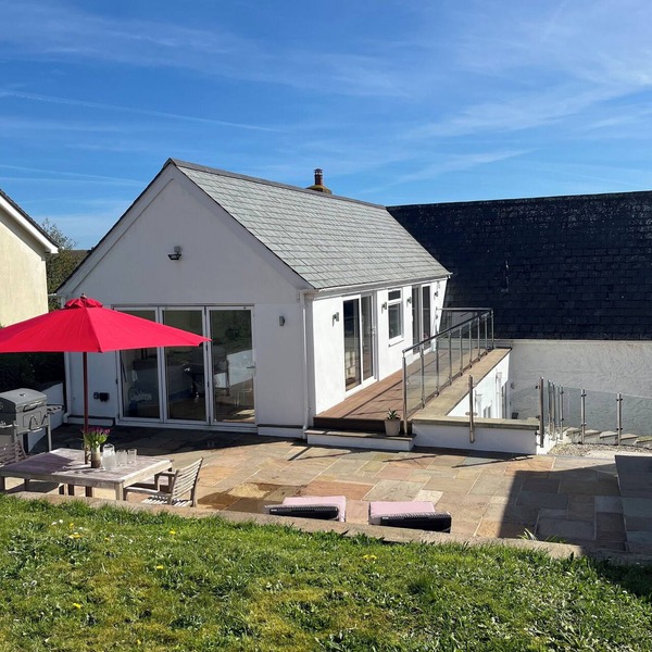 Windrush, Malborough. A spacious family home with a large patio and garden