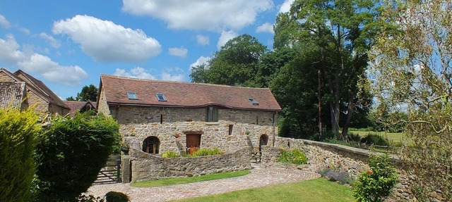 18th Century sandstone cottage with all modern comforts and old world charm.