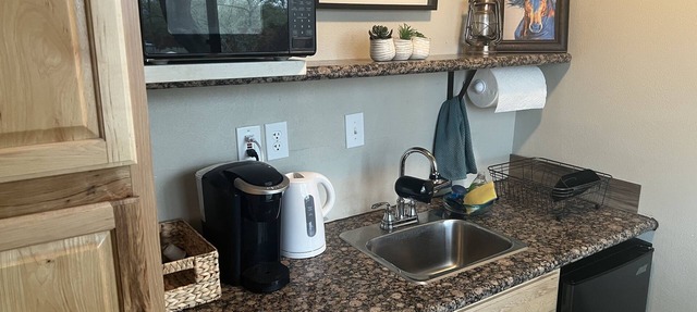 A cute and functional space located on beautiful 2.5 acres