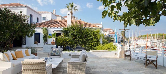 A lovingly maintained four bedroom waterfront house with a unique veranda