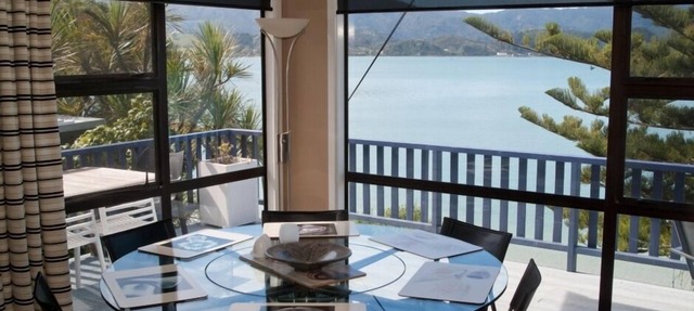 Beachfront Bliss ~ Upper Deck Apartment