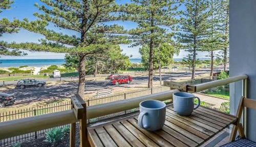 Beachfront self contained upstairs apartment