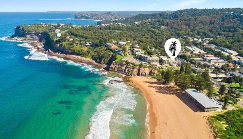Beachside escape steps from the surf & village