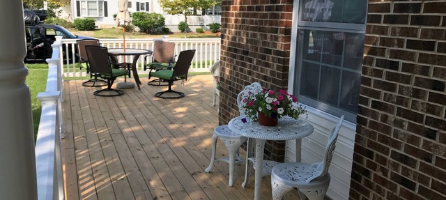 Beautiful corner property with cozy beach vibe.