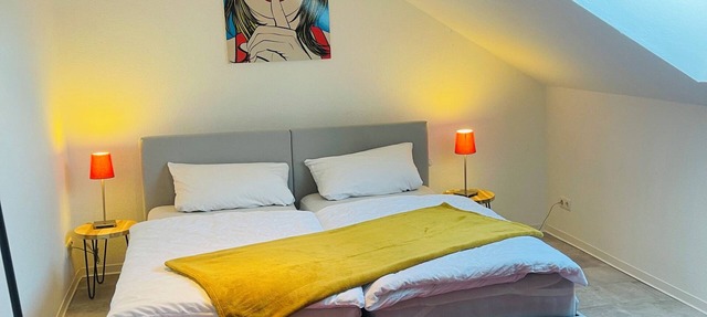 Bright, spacious attic apartment.