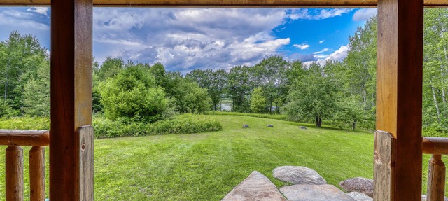 Bright three-level home with water views, jetted tub, firepit, and pool table