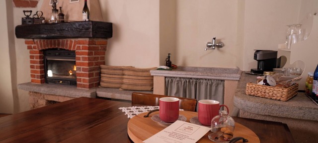 Bruno Selvago's Casba. Rustic house with exposed brick surrounded by vineyards.