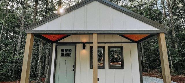 Cabin #1: Studio style layout with kitchenette and a large gravel parking pad beside the cabin for easy boat or trailer storage.