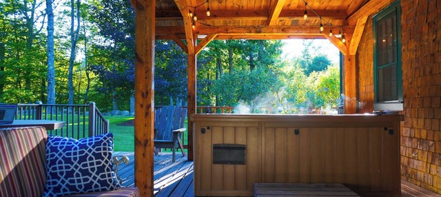 Central Escape is a spacious Lakes Region retreat just 5 minutes from downtown Meredith, less than a mile to Squam Lake and 20 minutes to concerts at the Bank of New Hampshire Pavilion. Enjoy the private year-round hot tub, fire pit, yard games!