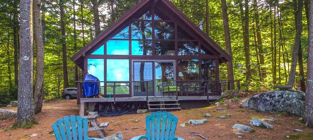 Chalet-style lakefront home with private dock, beach, kayak, canoe & epic view