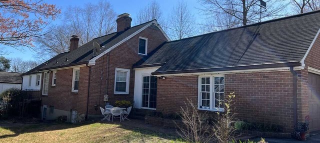 Charming brick ranch with an acre of beautiful garden